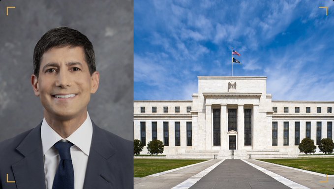 A professional headshot of a man in a dark suit and tie is shown alongside the Federal Reserve building flying the American flag. The image visually supports the post's reference to Kevin Warsh's hawkish inflation stance and the Federal Reserve's reluctance to cut rates, which prediction markets and retail traders appear to be ignoring.