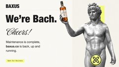 An advertisement featuring a marble statue of a man holding a bottle with the text 'BAXUS We're Bach. Cheers!' and a 'Maintenance is complete, hassle.io is back up and running' message.