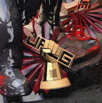 A close-up detail shot of a screen-printed artwork featuring geometric Greek key/meander motifs and Japanese rising sun patterns in red, gold, and black ink. The "detail vs final" post likely contrasts this zoomed-in view of intricate pattern work against the full composition to showcase the layering and textural details of the print.