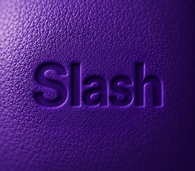 A close-up of the word 'Slash' embossed/debossed into textured purple leather material.
