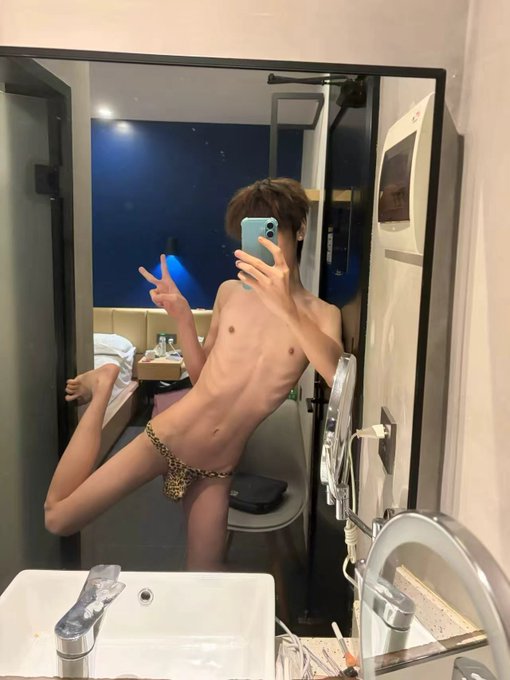 A person in leopard print underwear takes a mirror selfie, making a peace sign with their hand and the post says "Today's selfie".