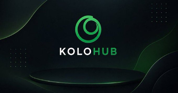 The image features a logo for a company called Kolo Hub, which is an online marketplace that allows users to buy and sell digital assets such as cryptocurrencies. The logo consists of a green circle with a white outline, representing the company's name "Kolo Hub". The background of the image is black, creating a stark contrast between the logo and its surroundings. In the bottom right corner of the image, there are some text elements that provide additional information about the company or its services.