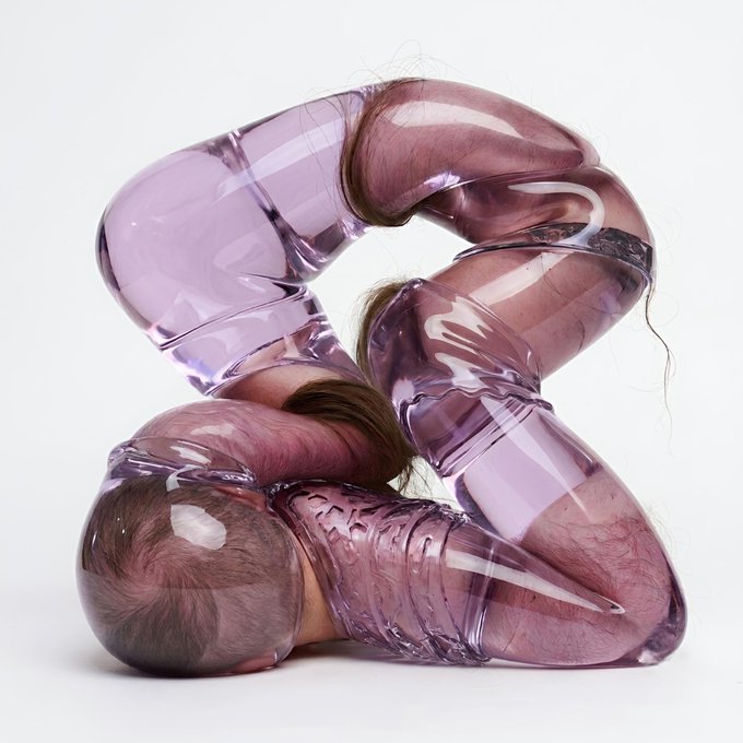 A surreal digital artwork showing a contorted, knotted figure made of translucent purple material with human hair visible inside, posed against a plain white background.