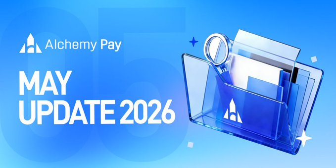 The image shows a blue folder with a magnifying glass inside, which appears to be an advertisement for AlchemyPay's May Update 2026. The folder has a magnifying glass on top of it, suggesting that the content inside might require some close examination or analysis. The text in the image reads "May Update 2026", indicating that this is the month being advertised and that the update is available for download.