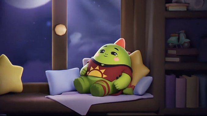 A cute green character wearing a red outfit relaxes on a star-shaped pillow by a window at night, illustrating the restful and cozy focus of the Sleepagotchi platform's behavior-driven approach to sleep improvement.