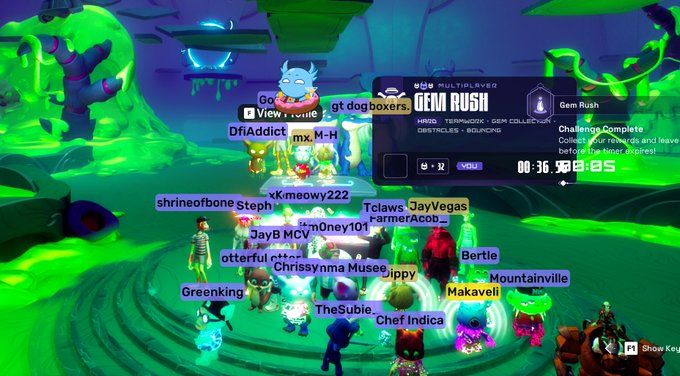 A screenshot from the Gem Rush multiplayer event in a green-themed 3D game environment showing numerous player usernames gathered together, with a 32-player capacity indicator and a 'Challenge Complete' message.