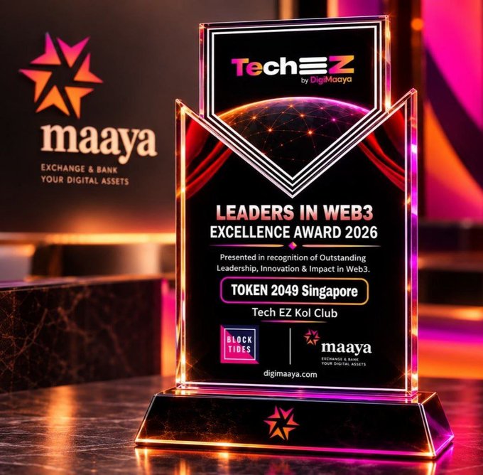 A glowing glass award trophy titled 'LEADERS IN WEB3 EXCELLENCE AWARD 2026' from Tech EZ and DigiMaaya is displayed against a dark background featuring the 'maaya EXCHANGE & BANK' logo and the text 'TOKEN 2049 Singapore'.
