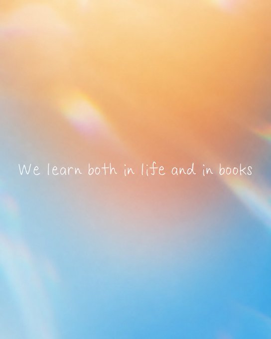An abstract blurry background of orange, yellow, and blue light rays with the handwritten text 'We learn both in life and in books'.