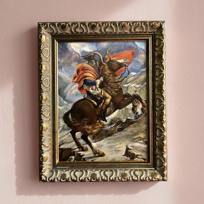 A framed oil painting of a figure in a red cape and bicorne hat riding a rearing brown horse through a mountainous landscape, signed 'Napoleon'.