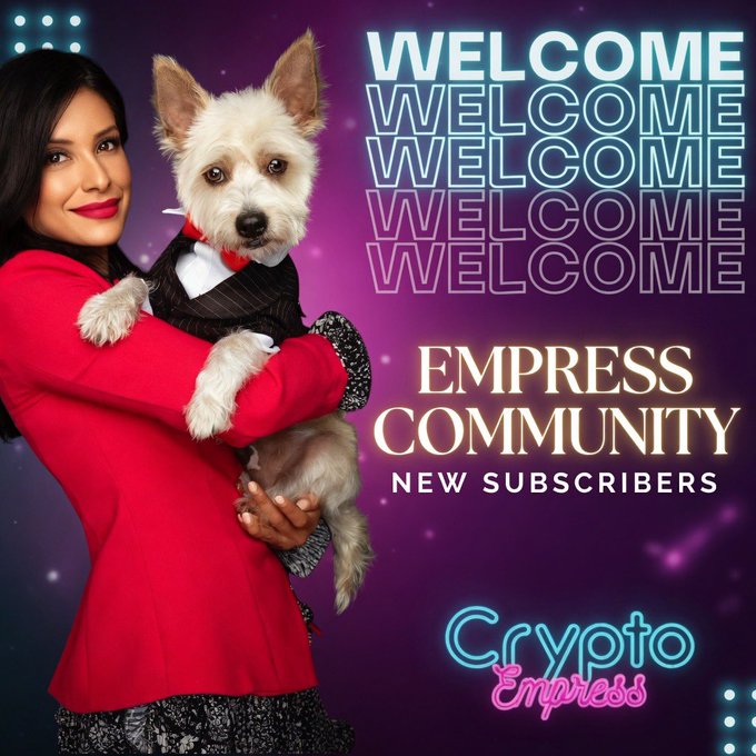 A woman in a red blazer smiles while holding a small dog in a tuxedo, with a purple cosmic background featuring the text "WELCOME" repeated, "EMPRESS COMMUNITY NEW SUBSCRIBERS," and "Crypto Empress" in neon-style lettering. The image serves as a celebratory graphic welcoming the two new subscribers mentioned in the post to the Crypto Empress community.