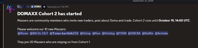 A Discord message from Big in Doma announcing 'DOMAXX Cohort 2 has started', welcoming 10 new Maxxers and noting they join 20 returning members, with Cohort 2 running until October 19, 14:00 UTC.