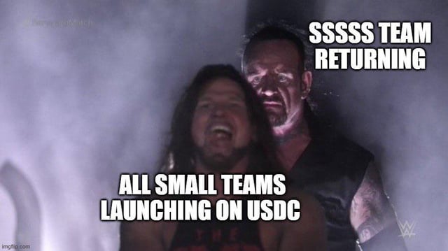 A WWE meme featuring The Undertaker and AJ Styles with text reading "SSSSS TEAM RETURNING" and "ALL SMALL TEAMS LAUNCHING ON USDC".