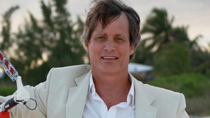 A man in a light-colored suit and white shirt, potentially Matthew Mellon, is pictured outdoors with a hint of a kite pole on the left, embodying the theme of spotting opportunities.