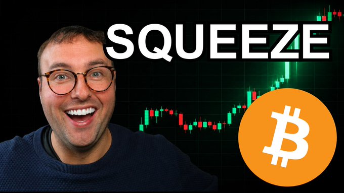 A man with glasses smiles enthusiastically next to the word 'SQUEEZE' and a Bitcoin logo, with a candlestick chart in the background.
