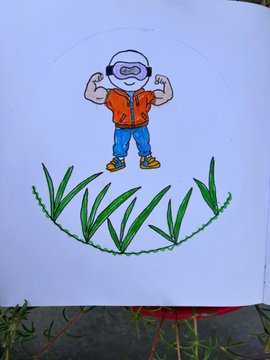 A hand-drawn illustration showing a muscular scuba diver in an orange vest and mask flexing his arms, surrounded by a circular border of green grass on white paper.
