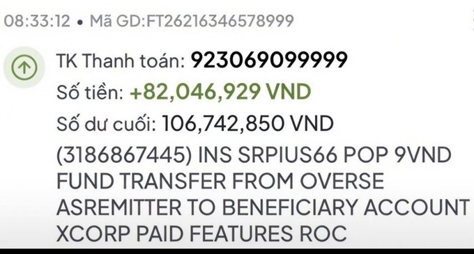 A banking transaction notification showing a transfer of +82,046,929 VND to account 923069099999, with transaction code FT26216346578999.