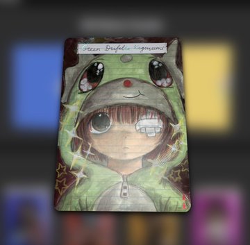 A drawing of a character wearing a green frog hoodie with the text 'Happy Birthday' on the hood.