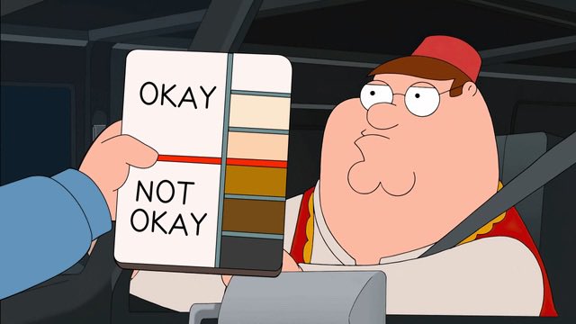 A cartoon character wearing a red fez and a red-and-yellow vest sits in a vehicle, glancing at an "OKAY/NOT OKAY" card being held up to him by a driver, while a seatbelt crosses his chest. The post references a memorable moment when this scene was shared on the Binance account, poking fun at the unbothered, sardonic facial expression on "Not Okay" levels in crypto.