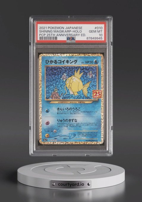 A graded PSA 10 '2021 POKEMON JAPANESE SHINING MAGIKARP-HOLO' card is displayed in a protective case on a rotating 'courtyard.io' stand.