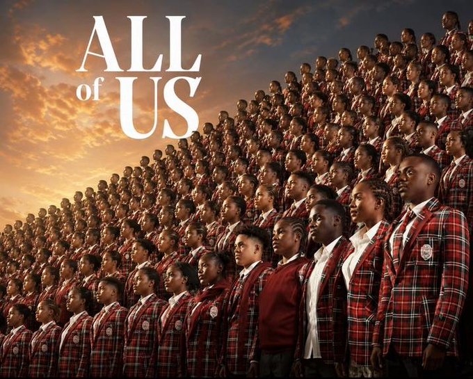 The image shows a large choir of students in red plaid school uniforms standing in tiered rows against a sunset sky, with the text "ALL of US" displayed in the upper left. The caption "ALL of US" paired with the post about $SUI suggests a message of inclusivity, rallying community support or expressing belief that everyone stands together behind the token.