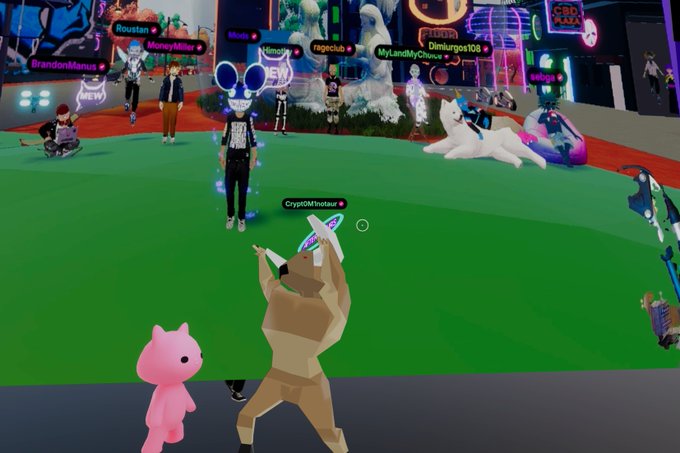 The image shows a vibrant Decentraland metaverse scene with avatars—including a prominent figure with mouse ears labeled "CryptOMeowtaur," "BrandonManuel," "MoneyMiller," "rageclub," "MyLandMyChoice," "Dimiurgos108," and "sebtapa"—gathered around a glowing "MEW" sign and unicorn. A brown minotaur-like character and a pink creature appear in the foreground, capturing the lively "MEW LIVE" event atmosphere described in the post.