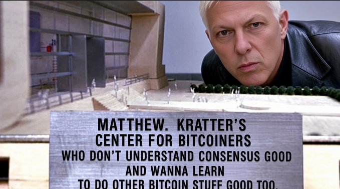 A man with white hair glares intensely from the top of an image featuring a scale model of a building, with a caption reading 'MATTHEW. KRATTER'S CENTER FOR BITCOINERS WHO DON'T UNDERSTAND CONSENSUS GOOD AND WANNA LEARN TO DO OTHER BITCOIN STUFF GOOD TOO.'