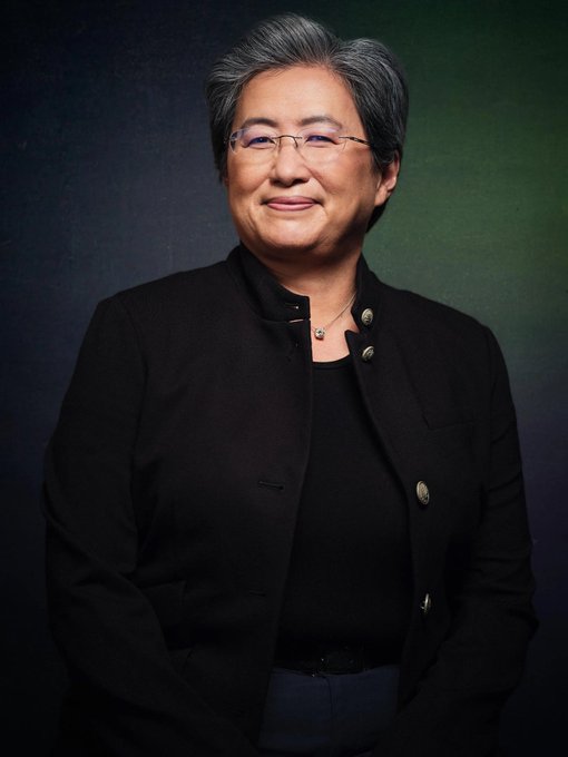 Lisa Su, who became the first female CEO to lead a company to $1 trillion in market value with AMD—a 500x increase from when she took over—smiles confidently in a professional portrait, embodying the historic achievement highlighted in the post.