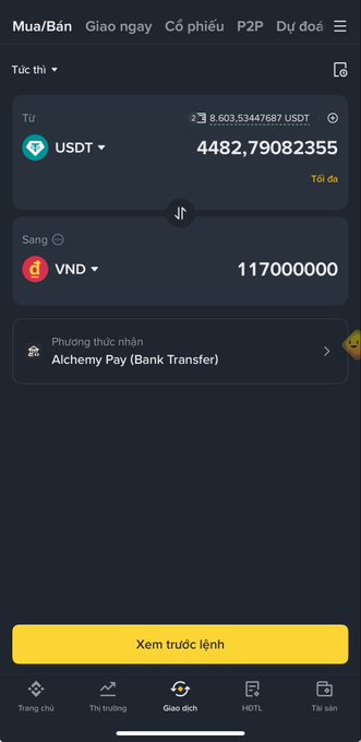 Screenshot of a Binance trading interface showing a USDT to VND exchange of 4,482.79082355 USDT for 117,000,000 VND via Alchemy Pay (Bank Transfer).