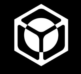 A hexagonal black-and-white logo for Nucleus, featuring three interlocking segments forming a triangular pattern around a central Y-shape, visually representing a modular, interconnected core structure that aligns with the post's emphasis on Nucleus treating distribution as a foundational "core layer" rather than an afterthought in Web3.