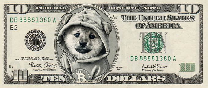 A $10 bill featuring a Shiba Inu dog wearing a hoodie in place of Alexander Hamilton, with a Bitcoin logo at the bottom.
