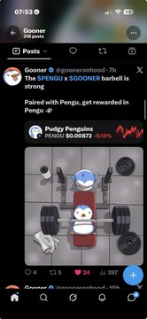 A mobile screenshot of a social media feed showing a post from 'Gooner' (@goonerxohood) about 'The SPENGU x GOONER barbell is strong', featuring an image of a Spengler from Ghostbusters figurine on a weight bench.