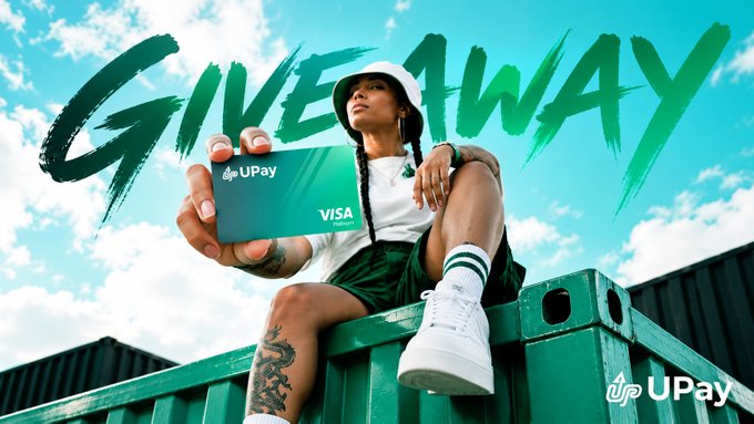 A UPay advertisement shows a woman holding a card marked “UPAY” and “VISA,” with large painted text reading “GIVE AWAY” and a UPay logo.