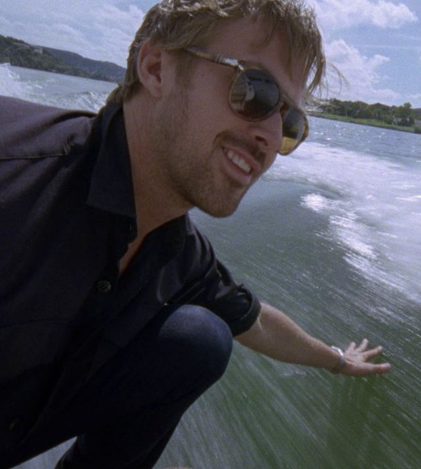 A blonde man wearing sunglasses and a dark button-up shirt reaches his hand out over a moving body of water, smiling as he rides a boat or jet ski.

The caption evokes a carefree, adventurous vibe, but doesn't directly relate to the post's serious discussion about crypto trading strategies. The image likely serves as a visual metaphor for the poster stepping back to relax and reset before tackling the next crypto cycle, contrasting the high-intensity "tryhard" trading lifestyle mentioned in the text with a moment of leisure.