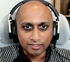 A bald man wearing over-ear headphones and a checkered jacket is shown in a close-up portrait, with his hairless head and eyes being referenced in the accompanying text as alleged effects of a "Suitcoiner" lifestyle. The image serves as visual support for the post's claims about hair loss and eye-related changes.
