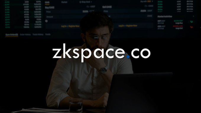 A bearded man wearing glasses sits thoughtfully at a laptop in a dimly lit room with trading data displayed on a screen behind him, overlaid with the text "zkspace.co" — visually reinforcing the domain's appeal to blockchain, crypto, and ZK-focused projects seeking a futuristic, professional identity.