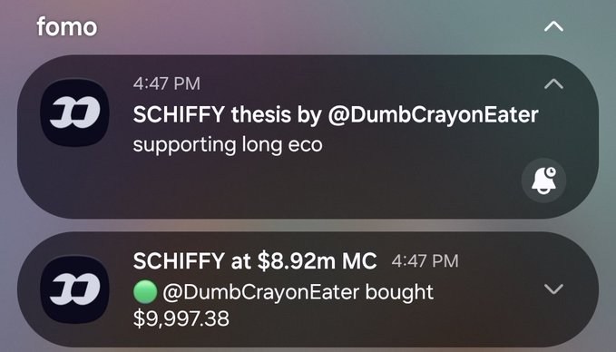 Mobile notification alerts showing a SCHIFFY token thesis supporting a long eco, and a trade alert noting SCHIFFY at $8.92m MC after @DumbCrayonEater bought $9,997.38.