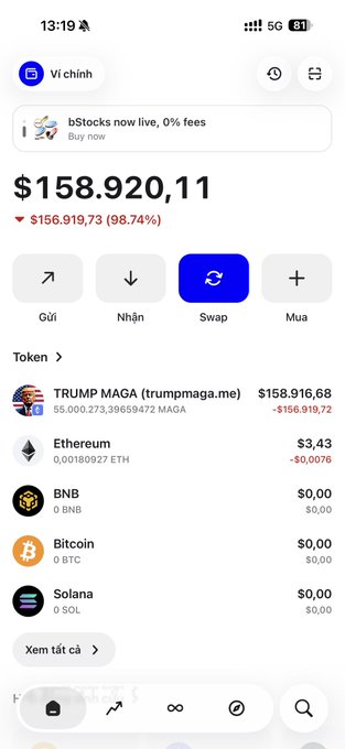 A Vietnamese crypto wallet app (Ví chính) displays a balance of $158,920.11, showing a 98.74% loss of $156,919.73, with the holdings dominated by 55 million TRUMP MAGA tokens worth just $158,916.68. The image visually illustrates the post's cautionary tale of buying a token that once reached tens of millions of dollars but is now nearly worthless and unsellable.