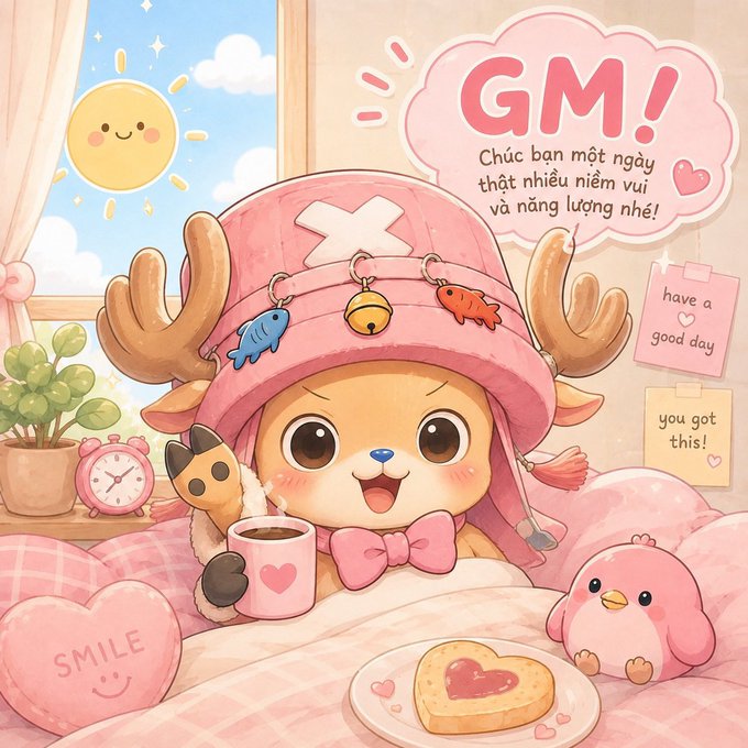 A pink-toned kawaii illustration features a cute character in a reindeer hat holding a mug, surrounded by a smiling sun, a chick, and a heart-shaped toast, with a speech bubble saying 'GM!' and the Vietnamese text 'Chúc bạn một ngày thật nhiều niềm vui và năng lượng nhé!' along with notes 'have a good day' and 'you got this!'.