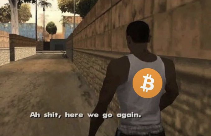 Meme screenshot from Grand Theft Auto: San Andreas showing the character CJ walking down an alleyway with a Bitcoin logo overlaid on his back and the caption 'Ah shit, here we go again.'