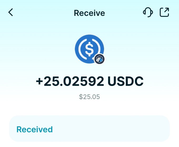 A mobile app screen showing a successful cryptocurrency transaction, displaying "+25.02592 USDC" ($25.05) received with a USDC coin icon.
