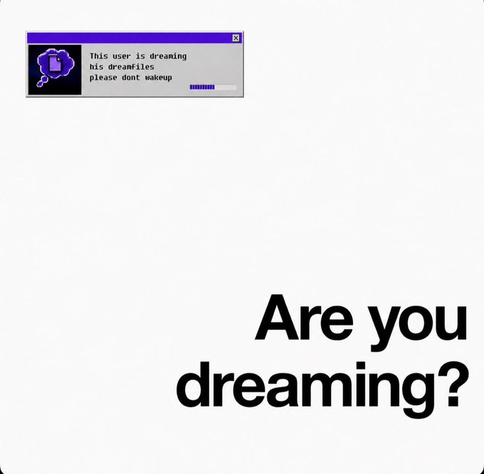 A retro Windows-style dialog box reads "This user is dreaming his dreamfiles please dont wakeup," paired with large text asking "Are you dreaming?"—visually reinforcing the $WAKEUP token's philosophical theme of questioning reality and sleep.