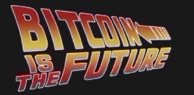 A stylized text graphic on a black background displays the phrase 'BITCOIN IS THE FUTURE' in a gradient of red, orange, and yellow lettering, resembling a retro or sports logo font.