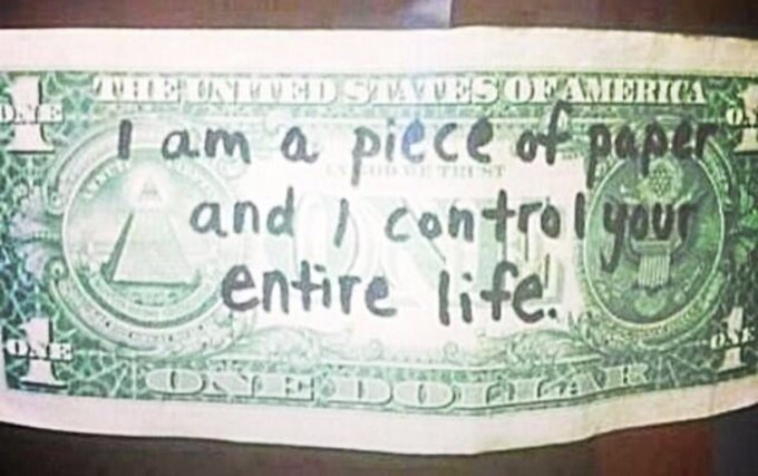 A handwritten message on a U.S. one-dollar bill declares, "I am a piece of paper and I control your entire life!"—a pointed critique of fiat currency control that ties directly to the post's "This is why we Bitcoin" sentiment, highlighting Bitcoin as an alternative to government-issued money.