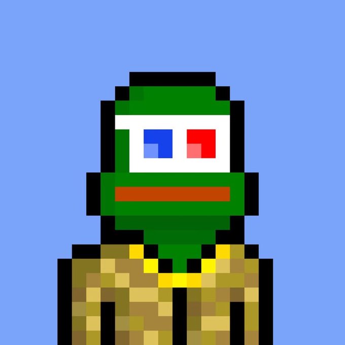 A rudimentary pixel art illustration of a green-faced character with mismatched blue and red eyes and a brown mouth, wearing a tan camouflage shirt against a solid blue background.
