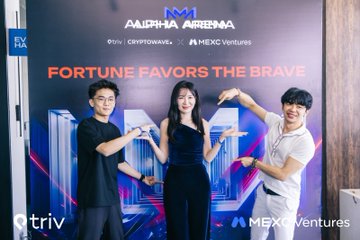 Three individuals pose enthusiastically in front of an "Alpha Arena" banner sponsored by Cryptowave and MEXC Ventures, displaying the slogan "Fortune Favors the Brave" above the word "NEXT." The celebratory scene captures the winners of the Alpha Arena Grand Final, reflecting the post's message that strategy and composure led to a strong finish in the competition.