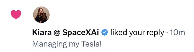 A Twitter/X notification showing that 'Kiara @ SpaceXAi' liked a reply with the text 'Managing my Tesla!'.