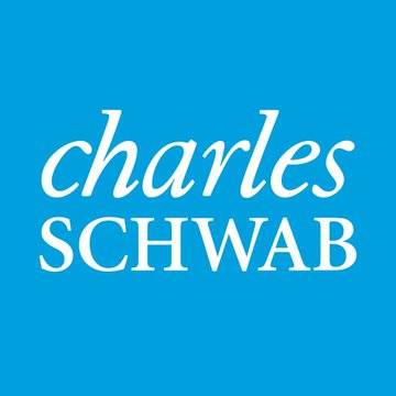 The image displays the Charles Schwab logo, featuring the company's name in white italic and capital lettering against a solid blue background. This logo relates directly to the news about Charles Schwab observing increased investor interest in the "debasement trade," particularly in assets like Bitcoin, gold, and precious metals.