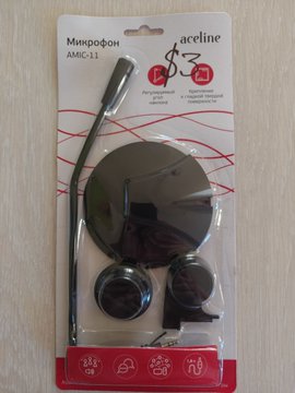 A packaged Aceline brand microphone (model AMIC-11) set in retail blister packaging with Russian text and instructions.