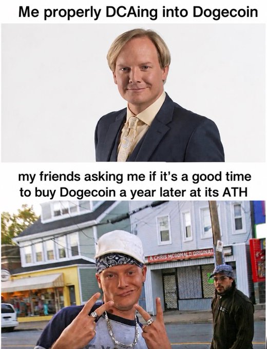 The image shows a man posing for a picture with his hands up, wearing a suit and tie, while another man poses next to him without any formal attire. The caption of the image reads "Me properly DCAing into Dogecoin", which is related to the post about Dogecoin.