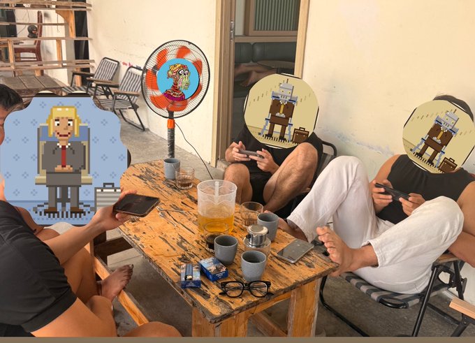 Casual photo of three friends sitting around a wooden table looking at their phones, with pixel art characters and a power button from a video game superimposed over the image.